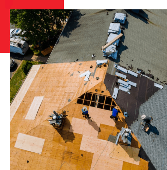 workers working on a roof