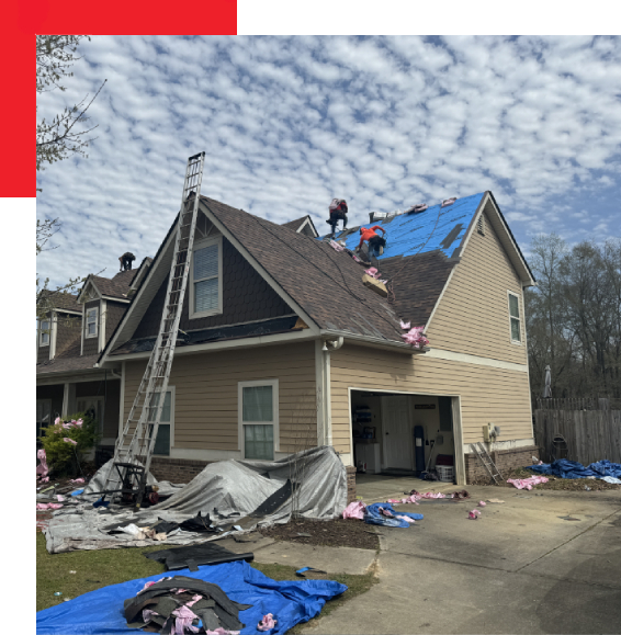 people working to repair a roof