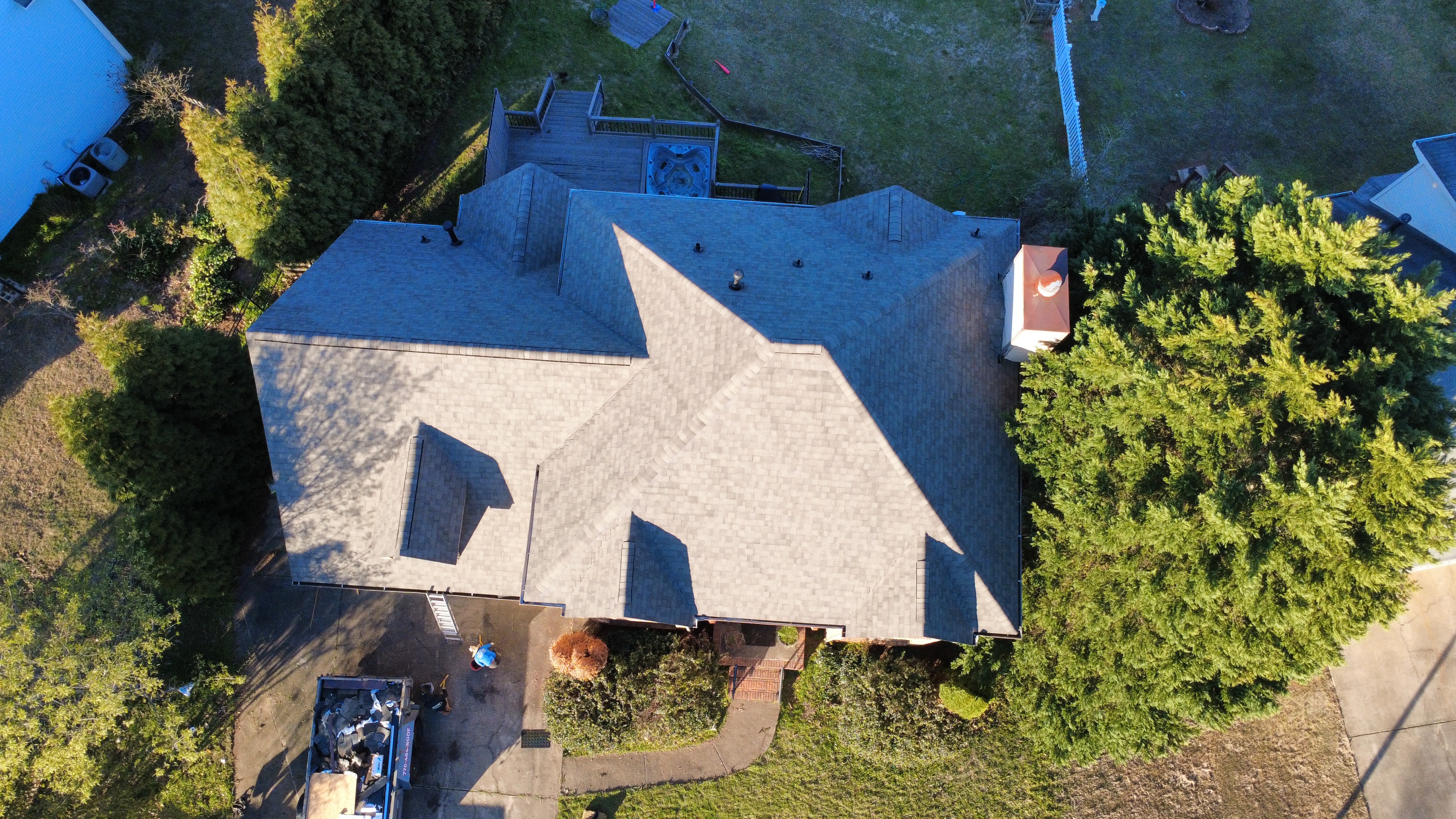 Roofing Company in Atlanta, GA 2 Roofing company Atlanta homeowners trust: completed architectural shingle roof on a two-story home