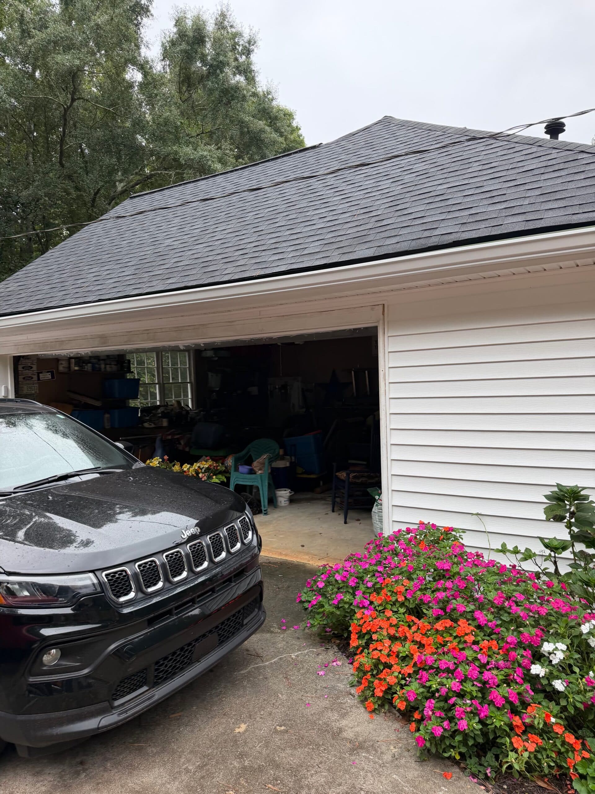 Vinyl Siding Woodstock Ga 2 Vinyl siding Woodstock GA project: white lap siding beside a garage and flower beds